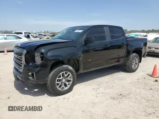 2021 GMC Canyon 4WD AT4 w/Leather with VIN 1GTG6FEN3M1274409, listed as a Copart auction lot 49228145 with 57,194 mi miles and Salvage Title. Bid and sale history available at carsss.com. Image 1.