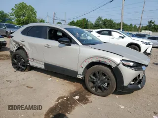 2024 Mazda CX-30 S Select Sport with VIN 3MVDMBBM7RM657971, listed as a Copart auction lot 59873125 with 9,355 mi miles and Salvage title. Bid and sale history available at DreamBid. Image 4.