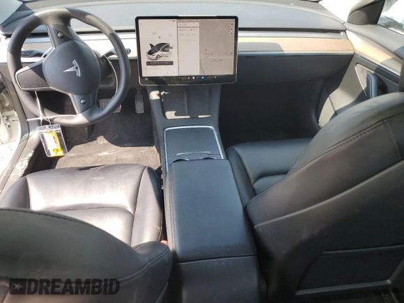 2023 Tesla Model 3 with VIN 5YJ3E1EA8PF449797, listed as a Copart auction lot 64601115 with 99,771 mi miles and Clean title. Bid and sale history available at DreamBid. Image 8.