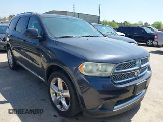 2013 Dodge Durango SXT z VIN 1C4RDHAGXDC693282, wystawiony jako IAAI lot #41874818 z przebiegiem 204 784 mil mil oraz . Historia ofert i sprzedaży dostępna na DreamBid. Obrazek 1.