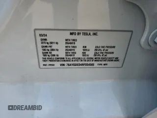 2024 Tesla Model Y z VIN 7SAYGDED4RF054565, wystawiony jako Copart lot #51188065 z przebiegiem 10 540 mil mil oraz Szkoda całkowita • Salvage title. Historia ofert i sprzedaży dostępna na DreamBid. Obrazek 16.