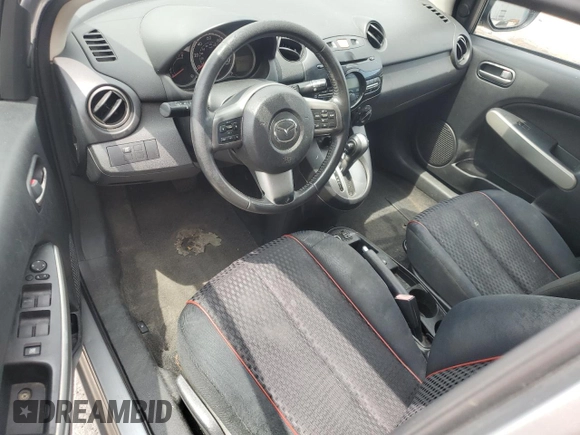 2013 Mazda 2 Touring z VIN JM1DE1LZ5D0162425, wystawiony jako Copart lot #59033595 z przebiegiem 225 932 mil mil oraz Szkoda całkowita • Salvage title. Historia ofert i sprzedaży dostępna na DreamBid. Obrazek 8.