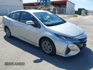 2021 Toyota Prius LE with VIN JTDKAMFP4M3175051, listed as a IAAI auction lot 41856383 with 106,642 mi miles and . Bid and sale history available at DreamBid. Image 1.
