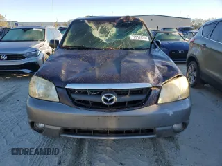 2002 Mazda Tribute LX with VIN 4F2YU09172KM62596, listed as a Copart auction lot 76912034 with 225,892 mi miles and Salvage Title. Bid and sale history available at carsss.com. Image 9.