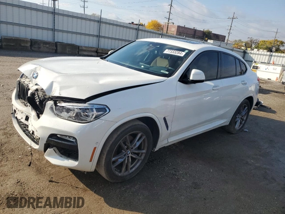 2019 BMW X4 xDrive30i with VIN 5UXUJ3C5XKLG54286, listed as a Copart auction lot 77333284 with 99,771 mi miles and Salvage Title. Bid and sale history available at carsss.com. Image 1.