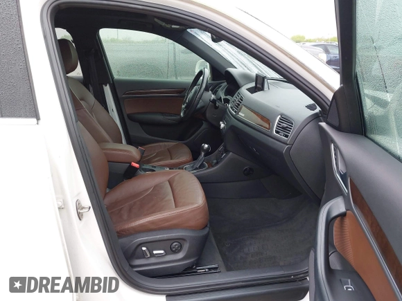2016 Audi Q3 Premium Plus with VIN WA1EFCFS7GR007879, listed as a IAAI auction lot 41861100 with 99,338 mi miles and . Bid and sale history available at DreamBid. Image 5.