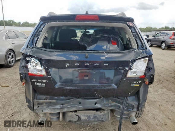 2012 Dodge Journey SXT with VIN 3C4PDCBG9CT208187, listed as a Copart auction lot 61969185 with 156,295 mi miles and Salvage title. Bid and sale history available at DreamBid. Image 6.