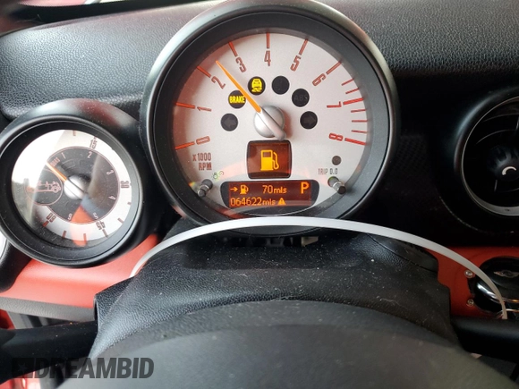 2013 MINI Roadster S z VIN WMWSY3C56DT593875, wystawiony jako Copart lot #74982124 z przebiegiem 64 622 mil mil oraz Szkody całkowita. Historia ofert i sprzedaży dostępna na DreamBid. Obrazek 9.