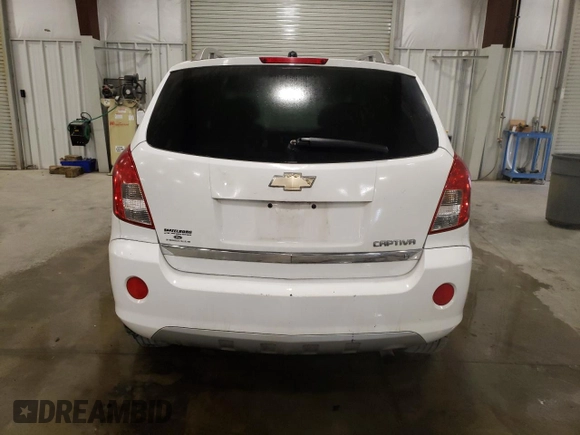 2014 Chevrolet Captiva Sport LT with VIN 3GNAL3EK4ES661268, listed as a Copart auction lot 74895224 with 128,513 mi miles and Salvage Title. Bid and sale history available at DreamBid. Image 6.
