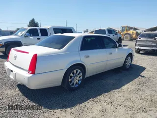 2008 Cadillac DTS 1SC with VIN 1G6KD57YX8U209792, listed as a IAAI auction lot 42003838 with 113,026 mi miles and . Bid and sale history available at carsss.com. Image 4.
