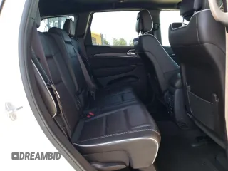 2018 Jeep Grand Cherokee Overland z VIN 1C4RJFCG4JC425589, wystawiony jako Copart lot #61775775 z przebiegiem 102 040 mil mil oraz Szkoda całkowita • Salvage title. Historia ofert i sprzedaży dostępna na DreamBid. Obrazek 11.