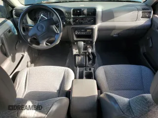 1999 Isuzu Rodeo S with VIN 4S2CM58W7X4359649, listed as a Copart auction lot 83450174 with 171,940 mi miles and Salvage title. Bid and sale history available at DreamBid. Image 8.