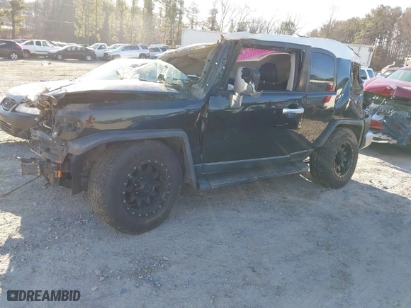 2007 Toyota FJ Cruiser with VIN JTEZU11FX70016328, listed as a IAAI auction lot 41596402 with 258,836 mi miles. Bid and sale history available at carsss.com. Image 2.