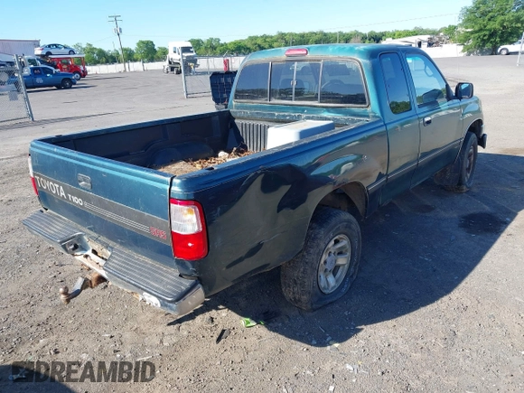 1997 Toyota T100 SR5 with VIN JT4UN24D8V0043214, listed as a IAAI auction lot 42194142 with 292,713 mi miles and . Bid and sale history available at DreamBid. Image 4.