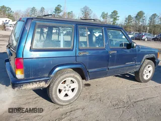 2001 Jeep Cherokee Sport with VIN 1J4FF58S01L527395, listed as a IAAI auction lot 41829601 with 265,465 mi miles and . Bid and sale history available at DreamBid. Image 6.