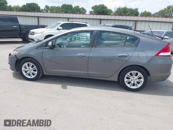 2010 Honda Insight EX with VIN JHMZE2H74AS040110, listed as a IAAI auction lot 42643669 with 189,531 mi miles and . Bid and sale history available at DreamBid. Image 14.