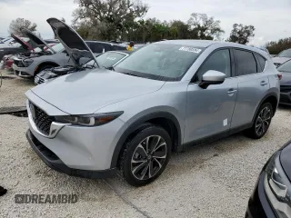 2022 Mazda CX-5 2.5 S Premium Package with VIN JM3KFBDM2N0647515, listed as a Copart auction lot 77780594 with 0 mi miles and Non Repairable. Bid and sale history available at carsss.com. Image 1.