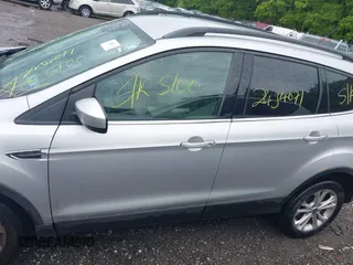 2018 Ford Escape SE with VIN 1FMCU9G99JUC41605, listed as a IAAI auction lot 39500946 with 114,032 mi miles. Bid and sale history available at carsss.com. Image 14.