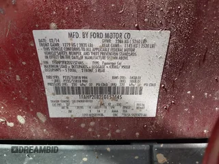 2014 Ford Taurus SEL z VIN 1FAHP2E82EG157445, wystawiony jako IAAI lot #42133676 z przebiegiem 174 616 mil mil oraz . Historia ofert i sprzedaży dostępna na DreamBid. Obrazek 9.