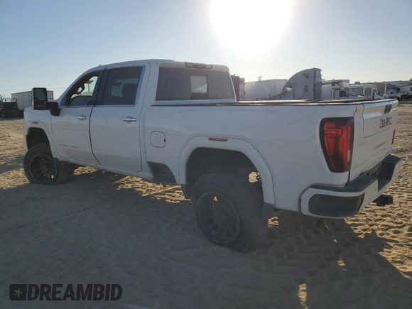 2021 GMC Sierra 3500HD Denali z VIN 1GT49WEYXMF156221, wystawiony jako Copart lot #81958804 z przebiegiem 60 986 mil mil oraz Nie do naprawy • Non repairable. Historia ofert i sprzedaży dostępna na DreamBid. Obrazek 2.