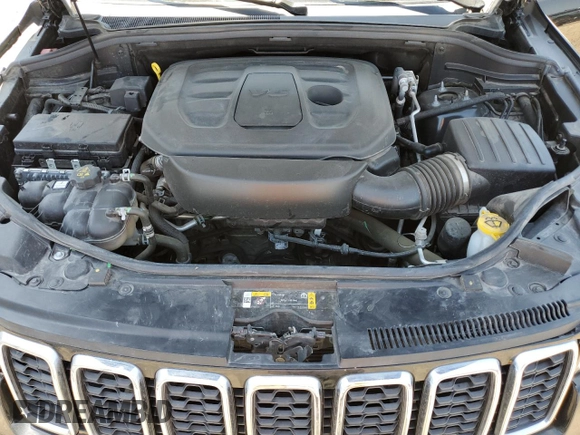 2021 Jeep Grand Cherokee Laredo E with VIN 1C4RJFAG8MC817661, listed as a Copart auction lot 52374235 with 25,305 mi miles and Salvage title. Bid and sale history available at DreamBid. Image 12.