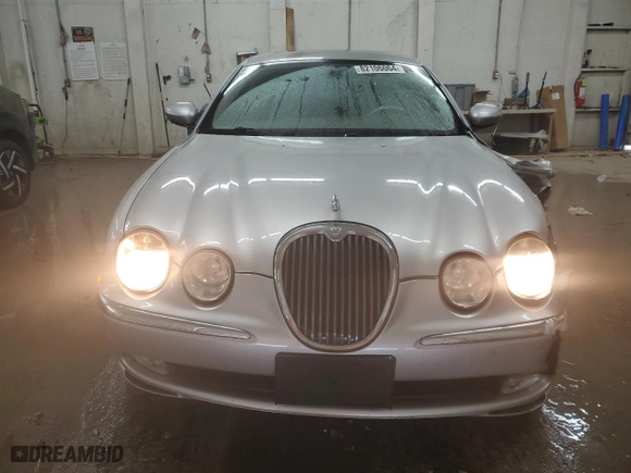 2004 Jaguar S-Type with VIN SAJEA01T74FN12824, listed as a Copart auction lot 82106064 with 0 mi miles and Salvage Title. Bid and sale history available at carsss.com. Image 5.