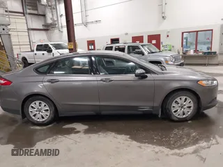 2013 Ford Fusion S with VIN 3FA6P0G7XDR215423, listed as a IAAI auction lot 42019599 with 134,433 mi miles. Bid and sale history available at carsss.com. Image 13.