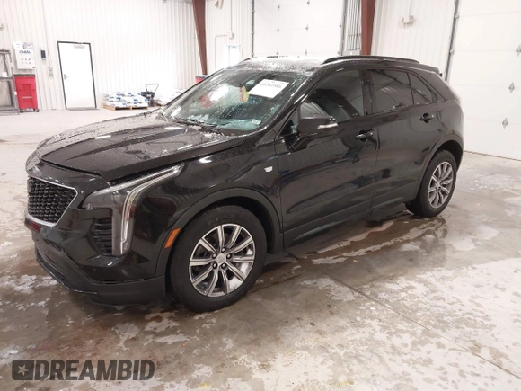 2020 Cadillac XT4 AWD Sport with VIN 1GYFZFR43LF090264, listed as a IAAI auction lot 41261586 with 65,859 mi miles and . Bid and sale history available at DreamBid. Image 2.