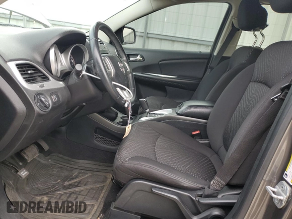 2013 Dodge Journey SXT with VIN 3C4PDCBG5DT695888, listed as a Copart auction lot 50302485 with 126,720 mi miles and Salvage Title. Bid and sale history available at DreamBid. Image 7.