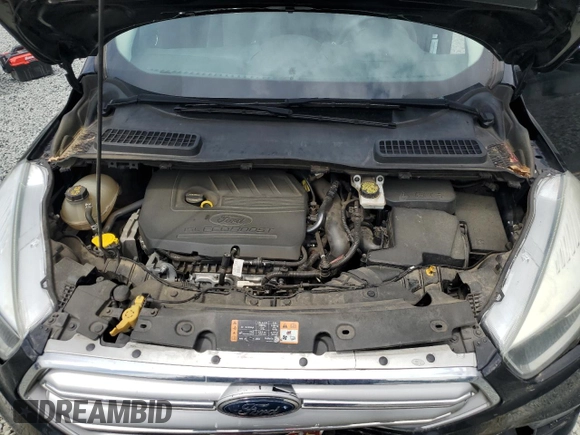 2017 Ford Escape SE z VIN 1FMCU0GD7HUA94744, wystawiony jako Copart lot #54209545 z przebiegiem 99 658 mil mil oraz Szkoda całkowita • Salvage title. Historia ofert i sprzedaży dostępna na DreamBid. Obrazek 11.