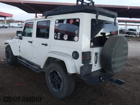 2014 Jeep Wrangler Unlimited Sahara with VIN 1C4BJWEG7EL204489, listed as a IAAI auction lot 41255239 with 68,803 mi miles and . Bid and sale history available at DreamBid. Image 3.