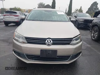 2013 Volkswagen Jetta SE z VIN 3VWDP7AJ4DM265033, wystawiony jako IAAI lot #41029651 z przebiegiem 126 879 mil mil oraz . Historia ofert i sprzedaży dostępna na DreamBid. Obrazek 13.
