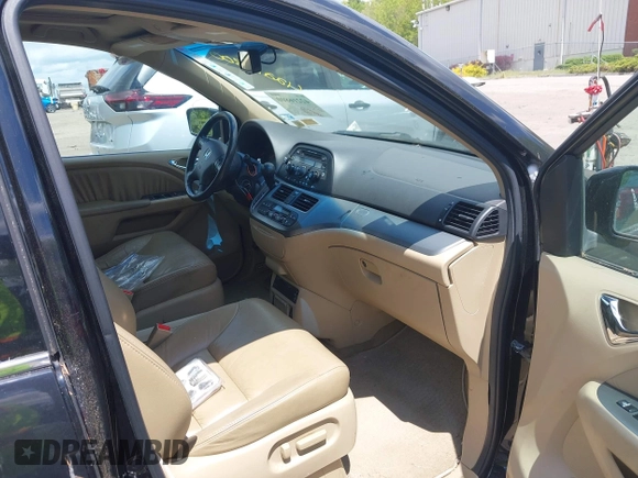 2008 Honda Odyssey EX-L with VIN 5FNRL38798B110317, listed as a IAAI auction lot 42216800 with 268,079 mi miles and . Bid and sale history available at carsss.com. Image 5.