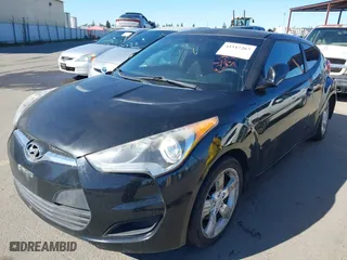 2015 Hyundai Veloster RE:FLEX with VIN KMHTC6AD7FU224291, listed as a IAAI auction lot 41517267 with 151,554 mi miles. Bid and sale history available at carsss.com. Image 2.