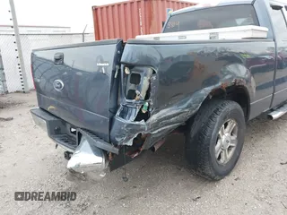 2005 Ford F-150 STX with VIN 1FTRX12W65FA56345, listed as a IAAI auction lot 41723884 with 251,594 mi miles. Bid and sale history available at carsss.com. Image 12.