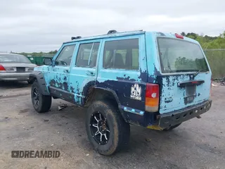 1997 Jeep Cherokee SE z VIN 1J4FJ28S3VL573144, wystawiony jako IAAI lot #41965201 z przebiegiem 298 276 mil mil oraz . Historia ofert i sprzedaży dostępna na DreamBid. Obrazek 3.