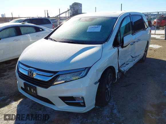 2018 Honda Odyssey Elite with VIN 5FNRL6H97JB039191, listed as a IAAI auction lot 41625687 with 54,363 mi miles and . Bid and sale history available at DreamBid. Image 2.
