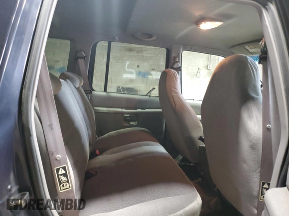 2000 Ford Explorer XLS z VIN 1FMZU72X7YUA71727, wystawiony jako Copart lot #51416935 z przebiegiem 163 005 mil mil oraz Szkoda całkowita • Salvage title. Historia ofert i sprzedaży dostępna na DreamBid. Obrazek 11.