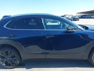 2021 Mazda CX-30 Premium with VIN 3MVDMBDYXMM307047, listed as a IAAI auction lot 41974966 with 53,409 mi miles and . Bid and sale history available at carsss.com. Image 14.