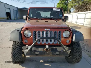2014 Jeep Wrangler Sport with VIN 1C4AJWAG8EL169530, listed as a Copart auction lot 51788825 with 197,642 mi miles and Salvage Title. Bid and sale history available at carsss.com. Image 5.