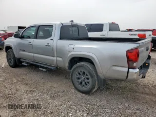 2022 Toyota Tacoma SR5 with VIN 3TMBZ5DN7NM033163, listed as a Copart auction lot 56769525 with 82,060 mi miles and Salvage title. Bid and sale history available at DreamBid. Image 2.