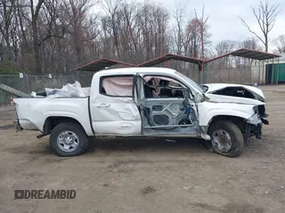 2022 Toyota Tacoma SR with VIN 3TYAX5GN3NT062077, listed as a IAAI auction lot 41886531 with 58,687 mi miles and . Bid and sale history available at DreamBid. Image 13.