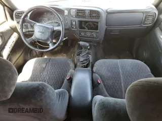 2001 GMC Jimmy SLE Rental Fleet z VIN 1GKDT13W212108144, wystawiony jako Copart lot #58753865 z przebiegiem 254 402 mil mil oraz Szkoda całkowita • Salvage title. Historia ofert i sprzedaży dostępna na DreamBid. Obrazek 8.