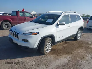 2018 Jeep Cherokee Latitude with VIN 1C4PJLCB2JD511083, listed as a IAAI auction lot 42070152 with 135,752 mi miles. Bid and sale history available at carsss.com. Image 2.