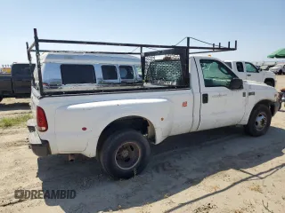 2003 Ford F-350 with VIN 1FTWF32S33EC43270, listed as a Copart auction lot 58818025 with 303,533 mi miles and Clean title. Bid and sale history available at DreamBid. Image 3.