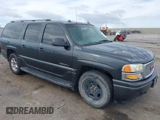 2003 GMC Yukon XL Denali with VIN 1GKFK66U63J249424, listed as a IAAI auction lot 41919651 with 102,802 mi miles. Bid and sale history available at carsss.com. Image 1.