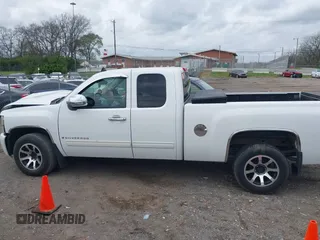 2009 Chevrolet Silverado 1500 LT with VIN 1GCEC29029Z267287, listed as a IAAI auction lot 41922651 with 235,636 mi miles. Bid and sale history available at carsss.com. Image 14.