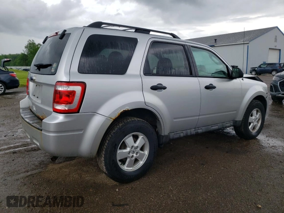 2010 Ford Escape XLS with VIN 1FMCU9C78AKD21851, listed as a Copart auction lot 61444945 with 70,404 mi miles and Clean title. Bid and sale history available at DreamBid. Image 3.