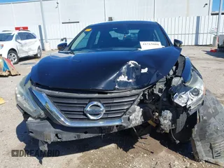 2016 Nissan Altima SV with VIN 1N4AL3AP1GC283029, listed as a IAAI auction lot 41715088 with 165,223 mi miles and . Bid and sale history available at DreamBid. Image 13.