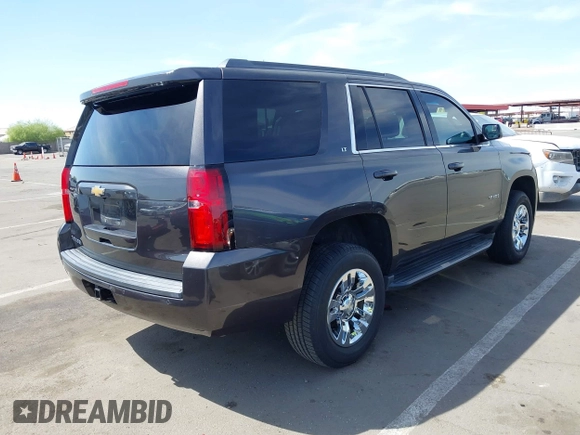 2017 Chevrolet Tahoe LT with VIN 1GNSCBKC5HR120345, listed as a IAAI auction lot 41988737 with 110,217 mi miles and . Bid and sale history available at DreamBid. Image 4.